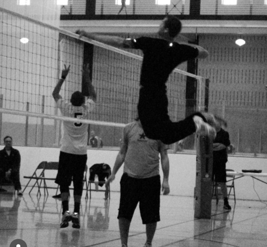 Players going up for a block